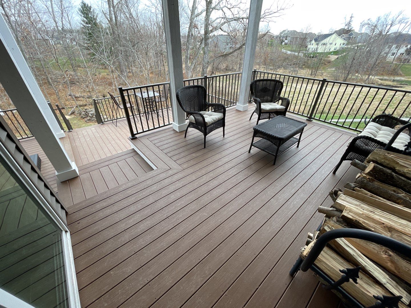 Close up of a front porch of a home with beige siding